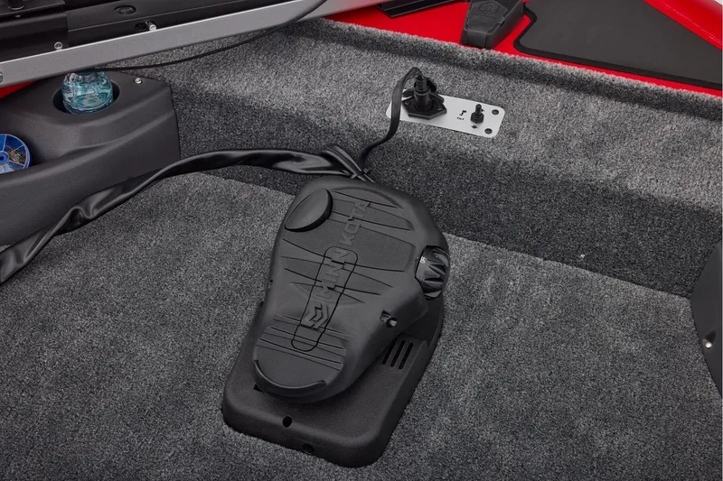 Slide: The Image of Manufacturer Provided Image: 2026 Tracker Pro Team 175 Crappie Edition boat interior with foot pedal and cup holder. - 18