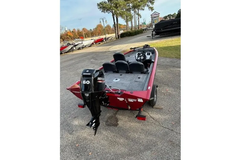 Slide: The Image of 2026 Tracker Pro Team 175 Crappie Edition boat with Mercury 60 engine, parked outdoors. - 53