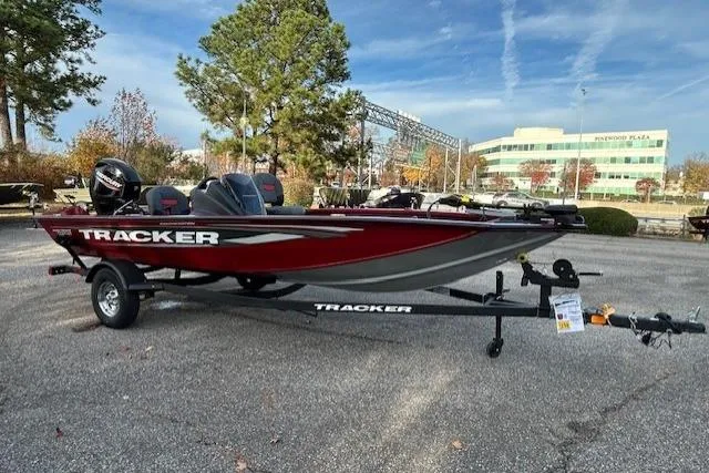 Slide: The Image of 2026 Tracker Pro Team 175 Crappie Edition boat on trailer, parked outdoors. - 55