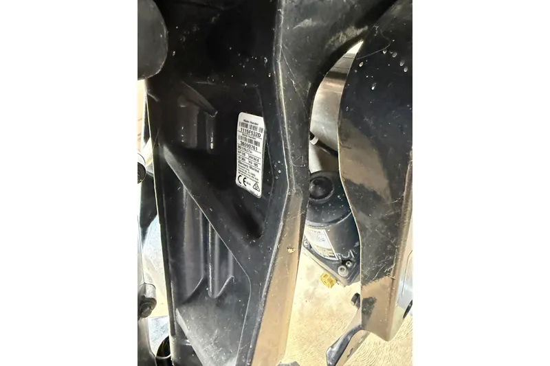 Slide: The Image of Close-up of a 2021 Crest Classic Platinum 240 SLC boat component with a visible label. - 15