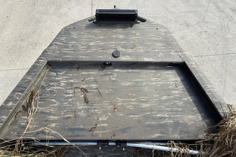 Slide: The Image of Camouflage deck of 2026 War Eagle 750 Gladiator boat, featuring rugged design. - 10