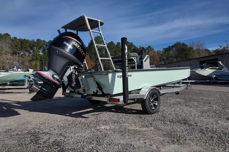 Slide: The Image of 2026 Xpress Skiff 185 boat deck with SeaDek and Minn Kota trolling motor. - 6