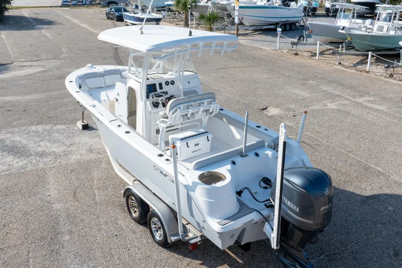 Slide: The Image of 2020 Sea Fox 249 Avenger boat on trailer, parked in a marina lot. - 10