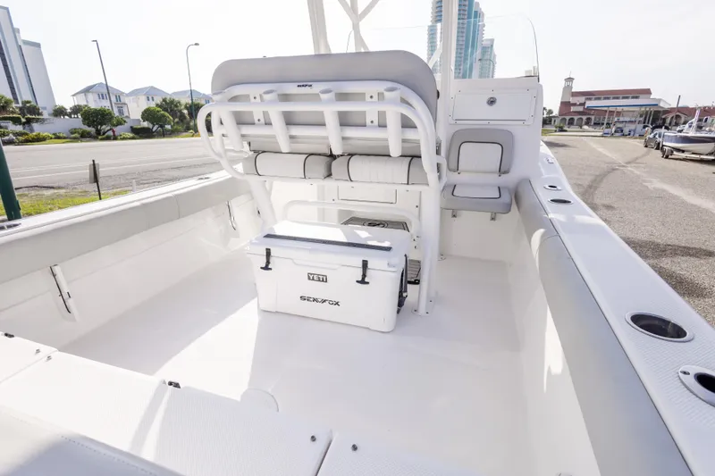 Slide: The Image of 2020 Sea Fox 249 Avenger boat interior with seating and Yeti cooler. - 26