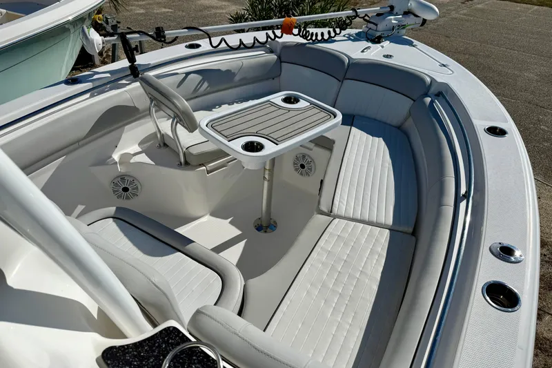 Slide: The Image of 2020 Sea Fox 249 Avenger boat interior with seating and table setup. - 29