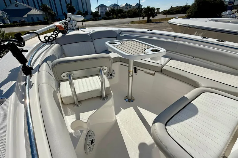 Slide: The Image of 2020 Sea Fox 249 Avenger boat interior with seating and table setup. - 30