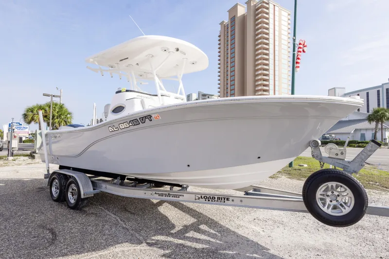 Slide: The Image of 2020 Sea Fox 249 Avenger boat on trailer, urban background, sunny day. - 6