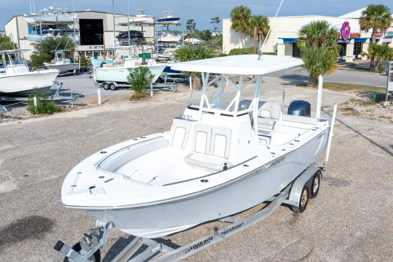 Slide: The Image of 2020 Sea Fox 249 Avenger boat on trailer in marina setting. - 9