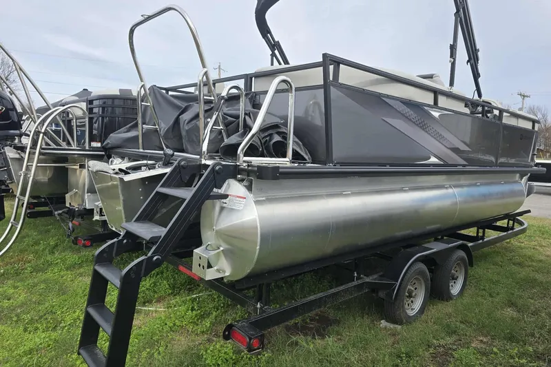 Slide: The Image of 2026 Dockside pontoon boat on trailer, featuring sleek design and sturdy construction. - 5