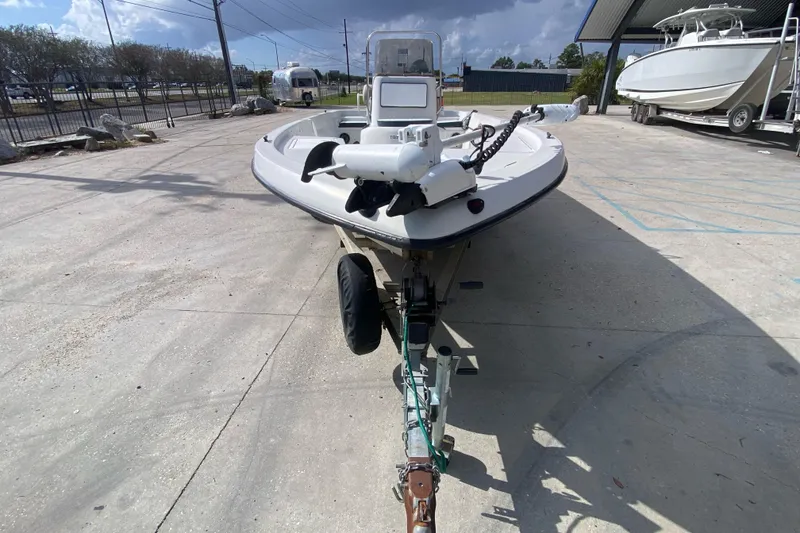 Slide: The Image of Bow view of a 2000 Sprint 221 boat with storage compartments and trolling motor. - 7