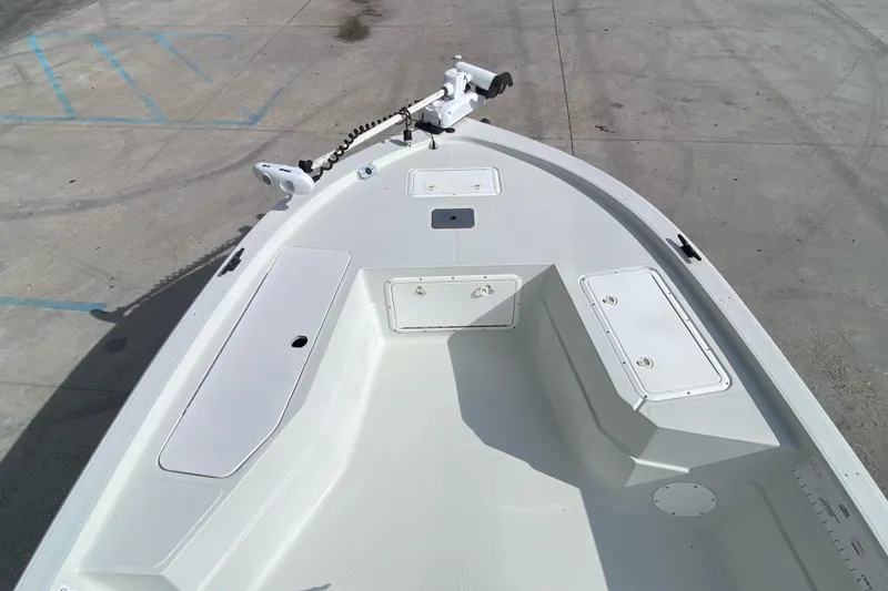Slide: The Image of Bow of a 2000 Sprint 221 boat with storage compartments and trolling motor. - 8