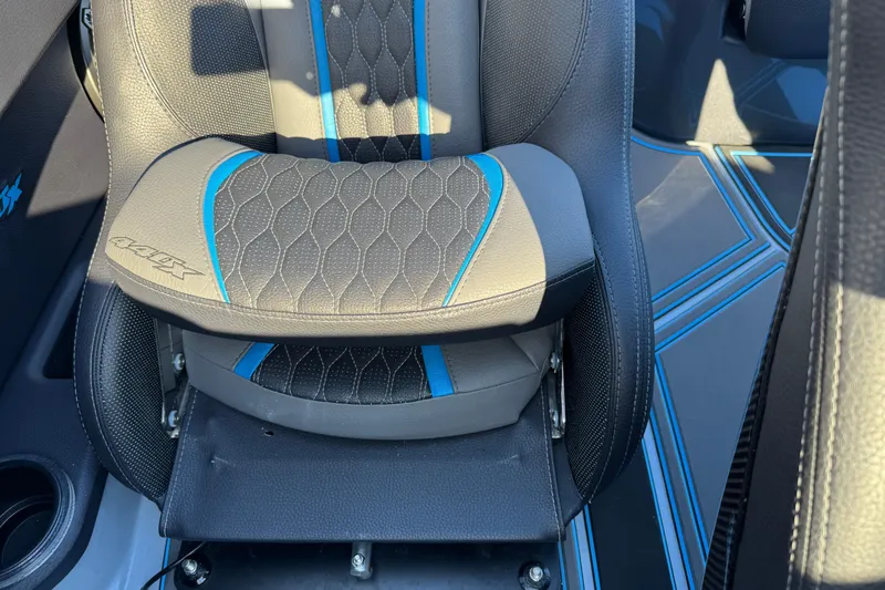 Slide: The Image of 2025 MTI 440X seat with black and blue accents, featuring modern design and stitching. - 16