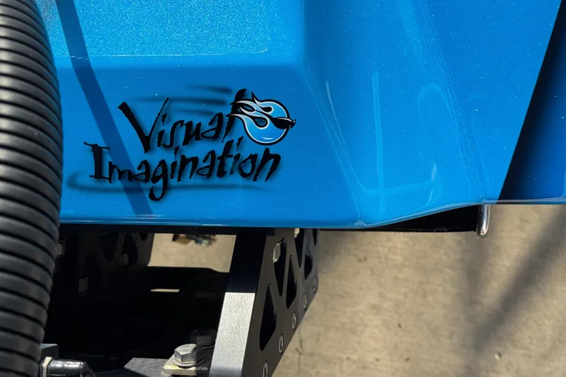 Slide: The Image of Blue MTI 440X boat with "Visual Imagination" logo, 2025 model. - 9