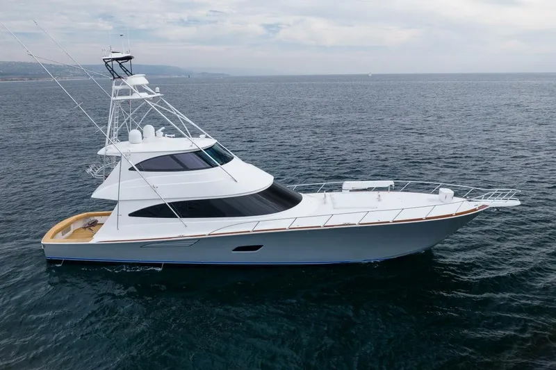 The Image of 2018 Viking 80 Enclosed Bridge yacht cruising on open sea. - 1