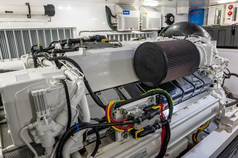 Slide: The Image of Engine room of 2018 Viking 80 Enclosed Bridge yacht, showcasing advanced machinery and components. - 47