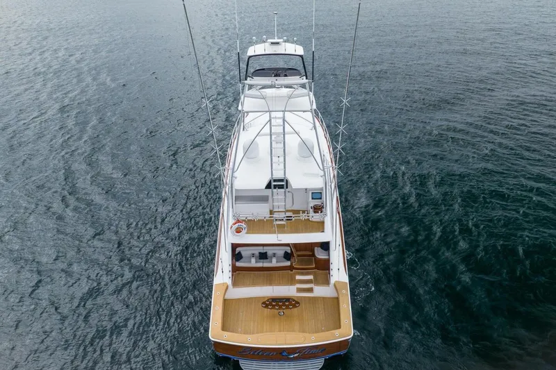 Slide: The Image of Aerial view of 2018 Viking 80 Enclosed Bridge yacht on open water. - 72