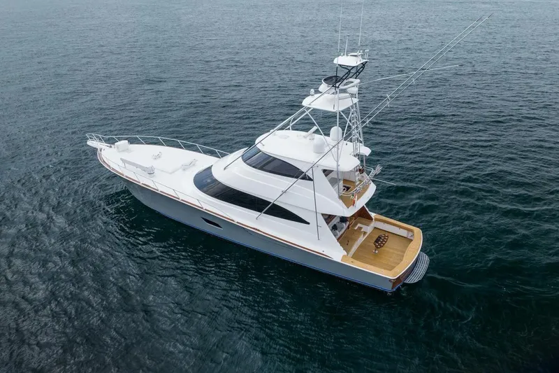 Slide: The Image of 2018 Viking 80 Enclosed Bridge yacht on open water. - 73