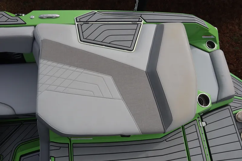 Slide: The Image of 2021 Nautique Super Air Nautique G23 boat seat with green and gray upholstery. - 26