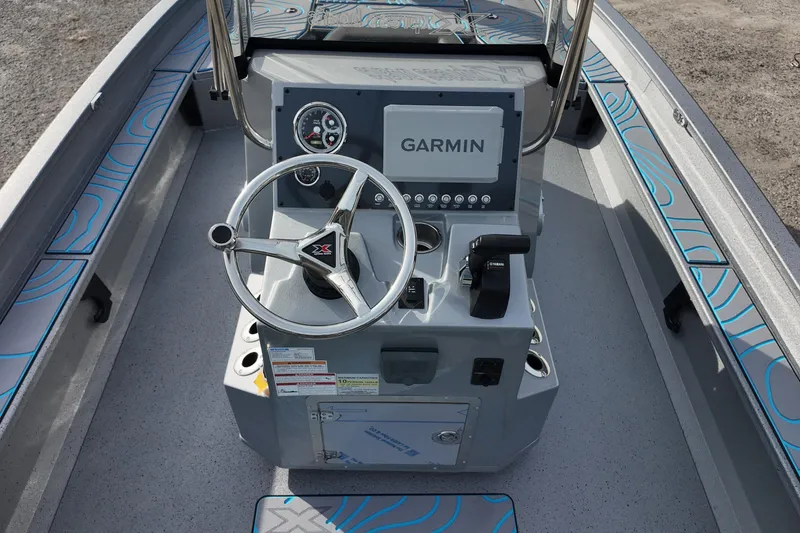 Slide: The Image of 2026 Xpress X23B Bay Lounge boat console with Garmin navigation system. - 15