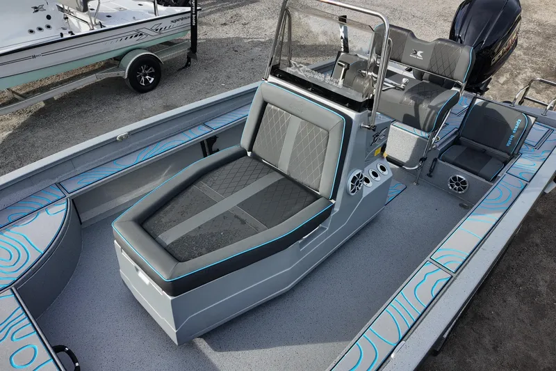 Slide: The Image of 2026 Xpress X23B Bay Lounge boat with modern seating and sleek design. - 9