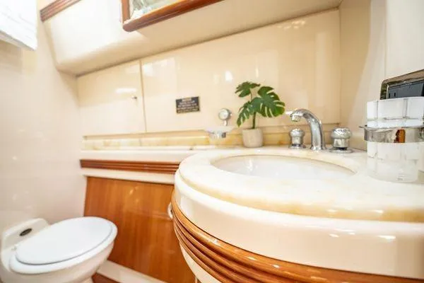 Slide: The Image of Luxurious bathroom in 2003 Azimut 80 Carat yacht with elegant fixtures and decor. - 18