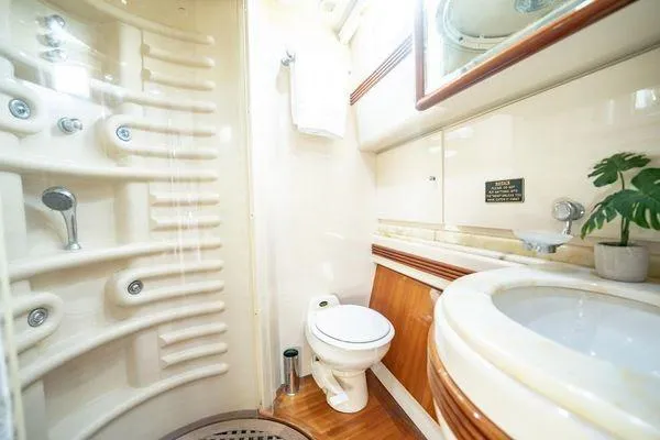 Slide: The Image of Luxurious bathroom in 2003 Azimut 80 Carat yacht with modern fixtures and elegant design. - 19