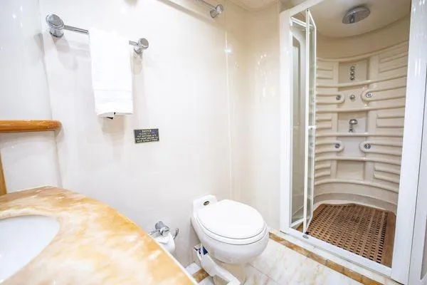 Slide: The Image of Luxurious bathroom in 2003 Azimut 80 Carat yacht with modern shower and elegant fixtures. - 23