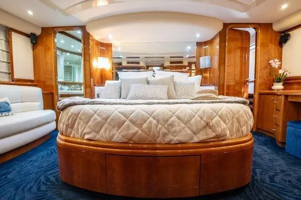 Slide: The Image of Luxurious bedroom interior of 2003 Azimut 80 Carat yacht with elegant wood finishes. - 33