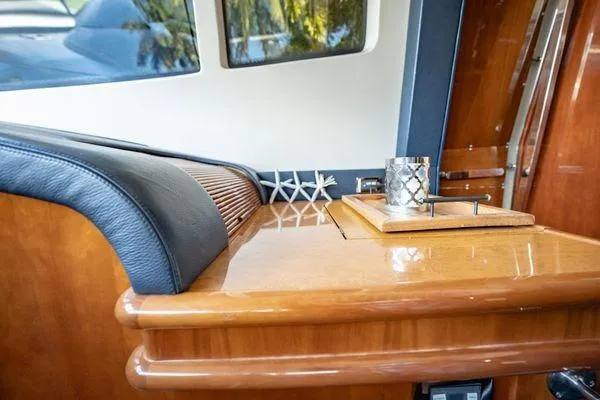 Slide: The Image of Luxurious interior of 2003 Azimut 80 Carat yacht with polished wood and elegant decor. - 39