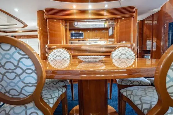 Slide: The Image of Luxurious interior of 2003 Azimut 80 Carat yacht with elegant dining area. - 44