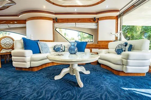 Slide: The Image of Luxurious interior of 2003 Azimut 80 Carat yacht with elegant seating and decor. - 47