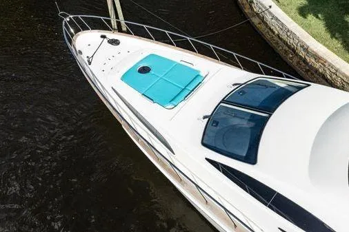 Slide: The Image of 2003 Azimut 80 Carat yacht docked, aerial view of sleek design and deck features. - 61