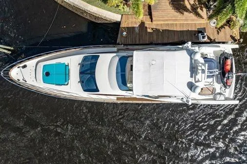 Slide: The Image of Overhead view of 2003 Azimut 80 Carat yacht docked by wooden pier. - 77