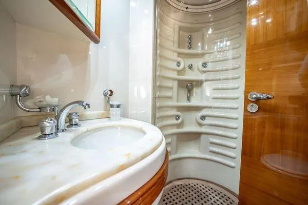 Slide: The Image of Luxurious bathroom in 2003 Azimut 80 Carat yacht with modern fixtures and elegant design. - 9