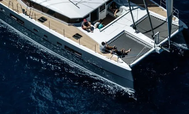 Slide: The Image of Aerial view of Eyecat 55 Autumn yacht sailing on deep blue ocean, 2024 model. - 11