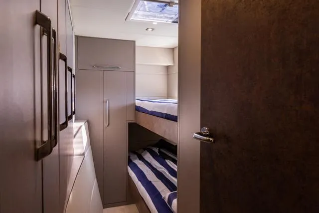 Slide: The Image of Compact cabin interior with bunk beds in 2024 Eyecat 55 Autumn model. - 19