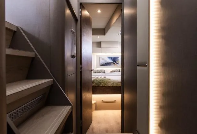 Slide: The Image of Luxurious interior of 2024 Eyecat 55 Autumn yacht, featuring modern bedroom and staircase. - 23