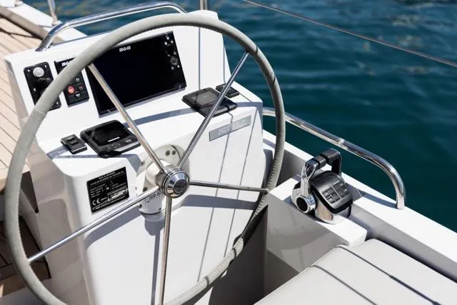 Slide: The Image of Steering wheel and controls of 2024 Eyecat 55 Autumn yacht on water. - 31