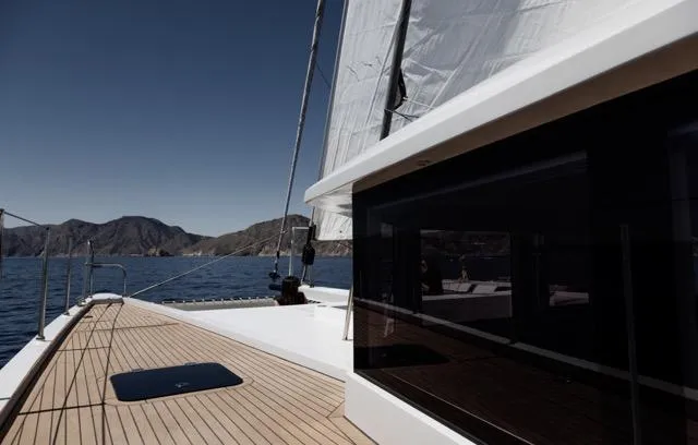 Slide: The Image of Sleek Eyecat 55 Autumn yacht sailing on a serene lake, 2024 model. - 34