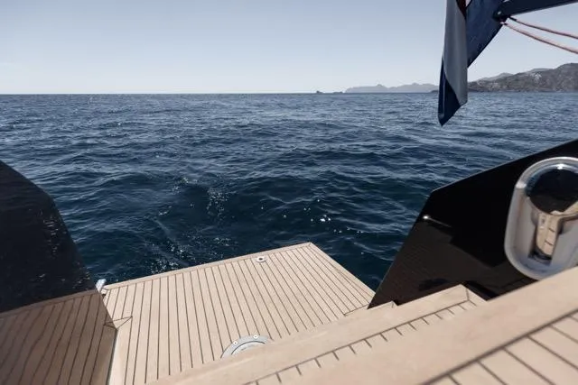 Slide: The Image of Luxury yacht deck overlooking the ocean, Eyecat 55 Autumn, 2024 model. - 38