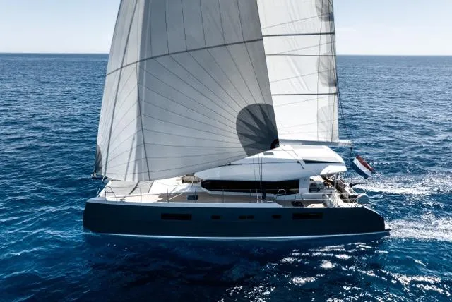 Slide: The Image of Sailing yacht Eyecat 55 Autumn 2024 gliding on open sea with full sails. - 4