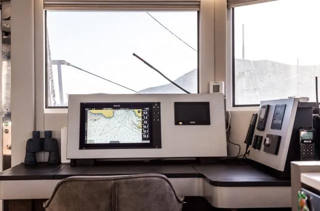 Slide: The Image of Modern navigation station inside 2024 Eyecat 55 Autumn yacht, featuring advanced control panels and equipment. - 43