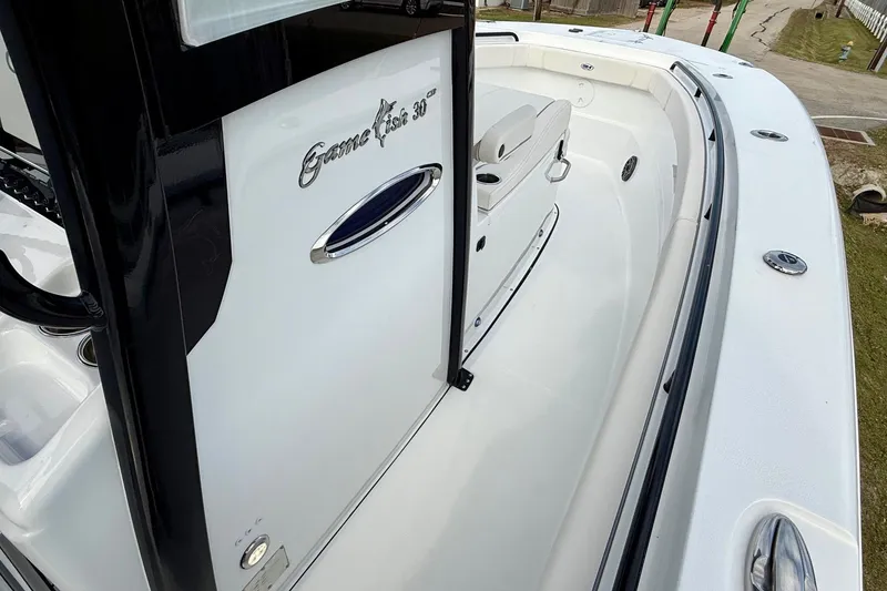 Slide: The Image of 2026 Sea Hunt Gamefish 30 Coffin Box boat interior, showcasing sleek design and spacious seating. - 16