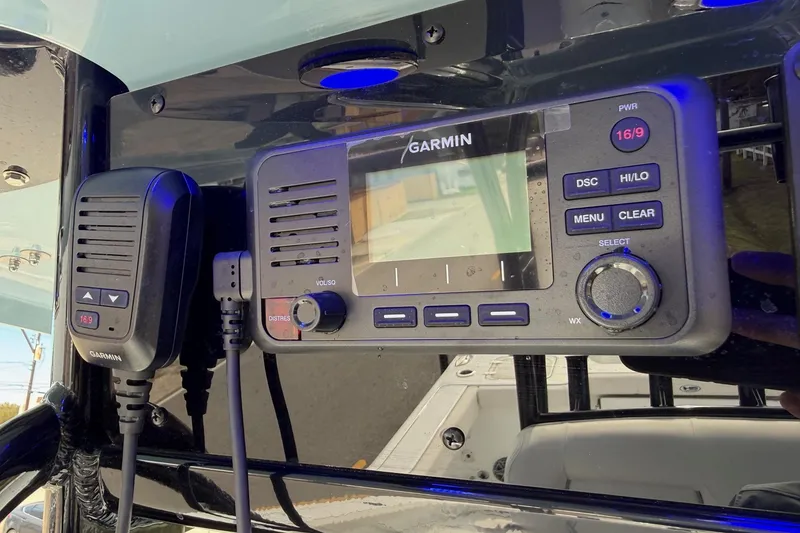Slide: The Image of Garmin marine radio on 2026 Sea Hunt Gamefish 30 Coffin Box boat dashboard. - 21