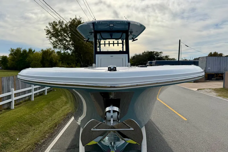 Slide: The Image of 2026 Sea Hunt Gamefish 30 Coffin Box boat on road, front view. - 6