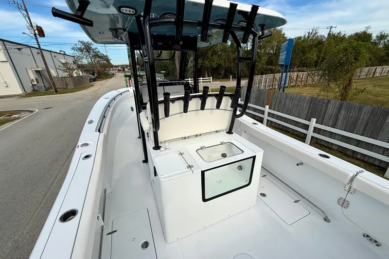 Slide: The Image of 2026 Sea Hunt Gamefish 30 Coffin Box boat interior, featuring spacious deck and storage. - 9