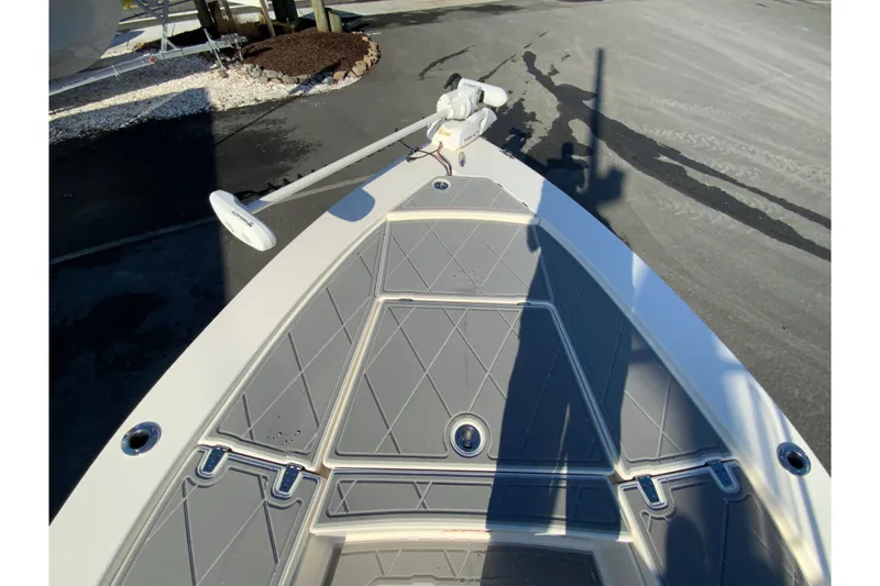 Slide: The Image of Bow of 2023 Pathfinder 2300 HPS boat with trolling motor and non-slip deck. - 25
