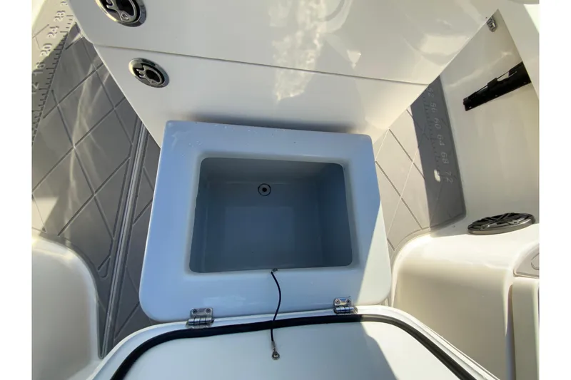 Slide: The Image of 2023 Pathfinder 2300 HPS boat interior with open storage compartment. - 29