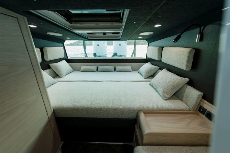 Slide: The Image of Luxurious interior of 2026 Axopar 45 XC AC Sandstone Lithium boat cabin. - 6