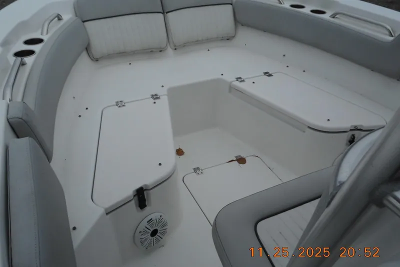 Slide: The Image of 2021 Sea Fox 228 Commander boat interior with seating and storage compartments. - 10